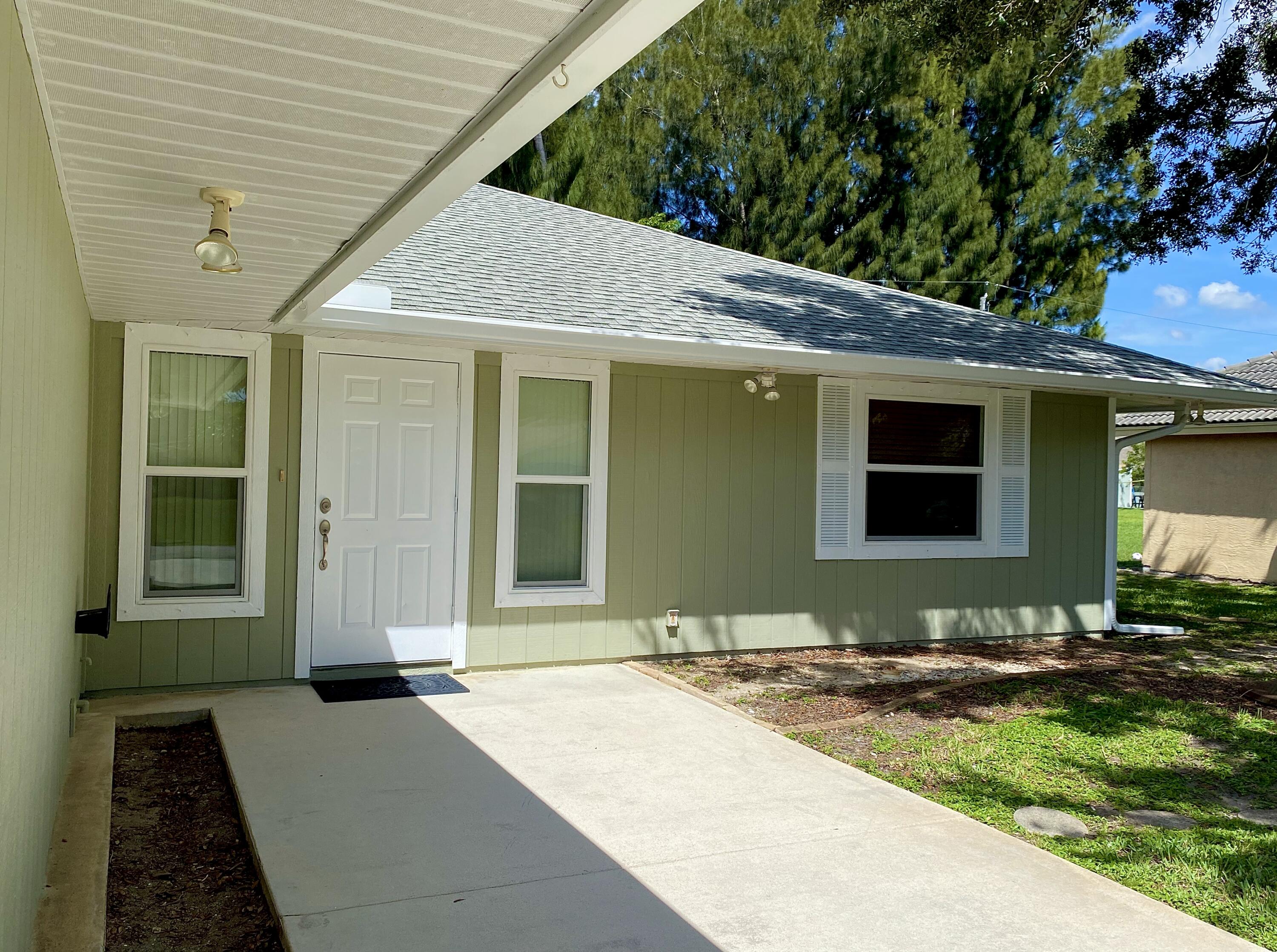 1045 Southwest Bay State Road Port St. Lucie, FL 34953 - Photo 16 of 62 1713A9A3-397D-4E18-9F5E-144C67921041