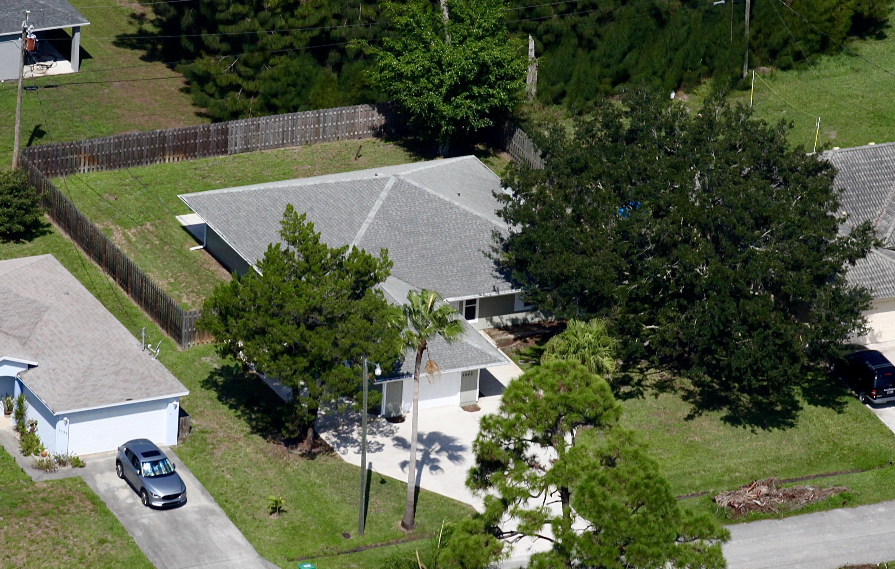 1045 Southwest Bay State Road Port St. Lucie, FL 34953 - Photo 2 of 62 F320127C-4C0F-4CDA-8571-9CA8B4A522B7
