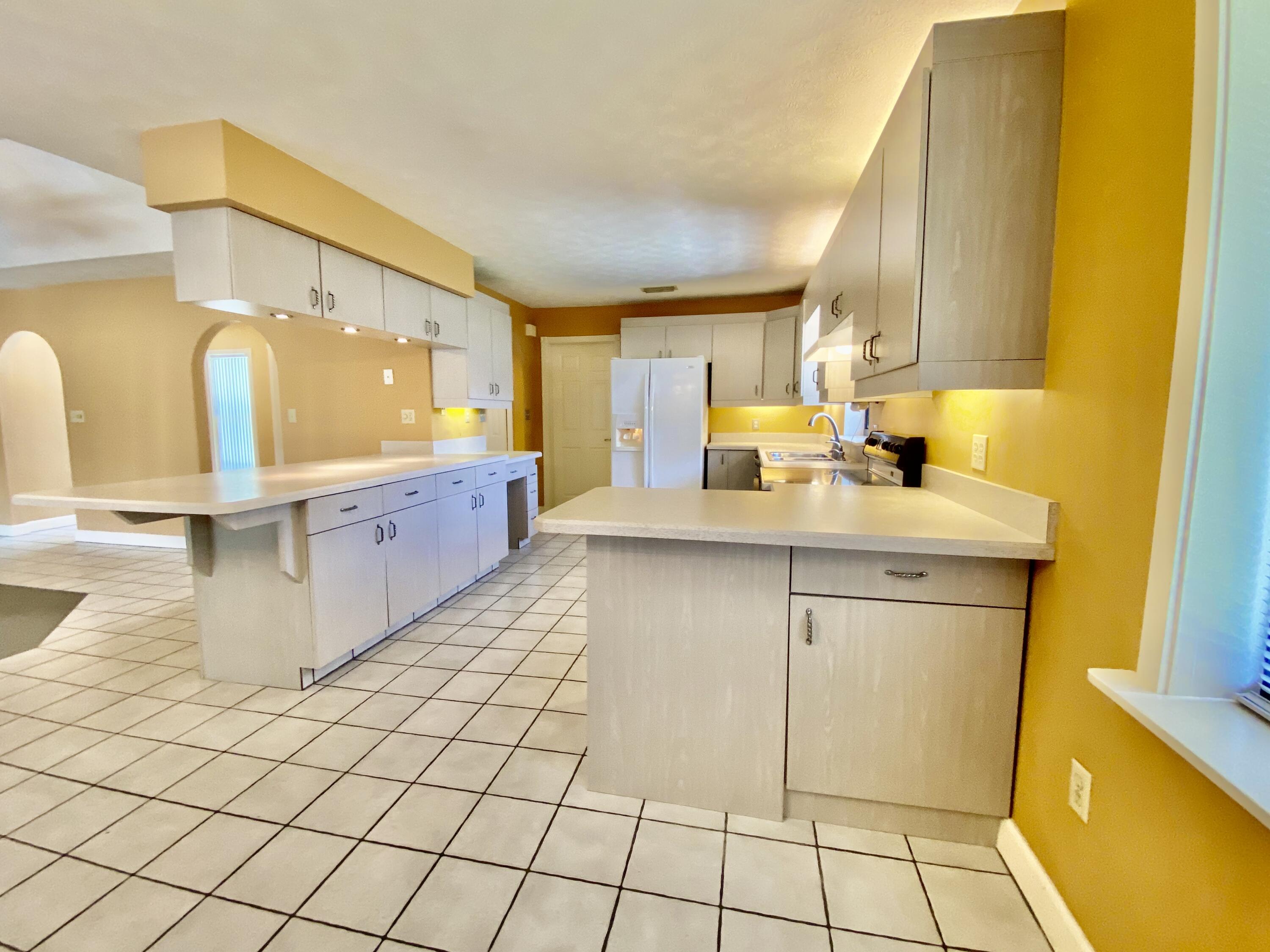 1045 Southwest Bay State Road Port St. Lucie, FL 34953 - Photo 25 of 62 6D523747-68C8-4BE8-A775-26D5F1F35D7A