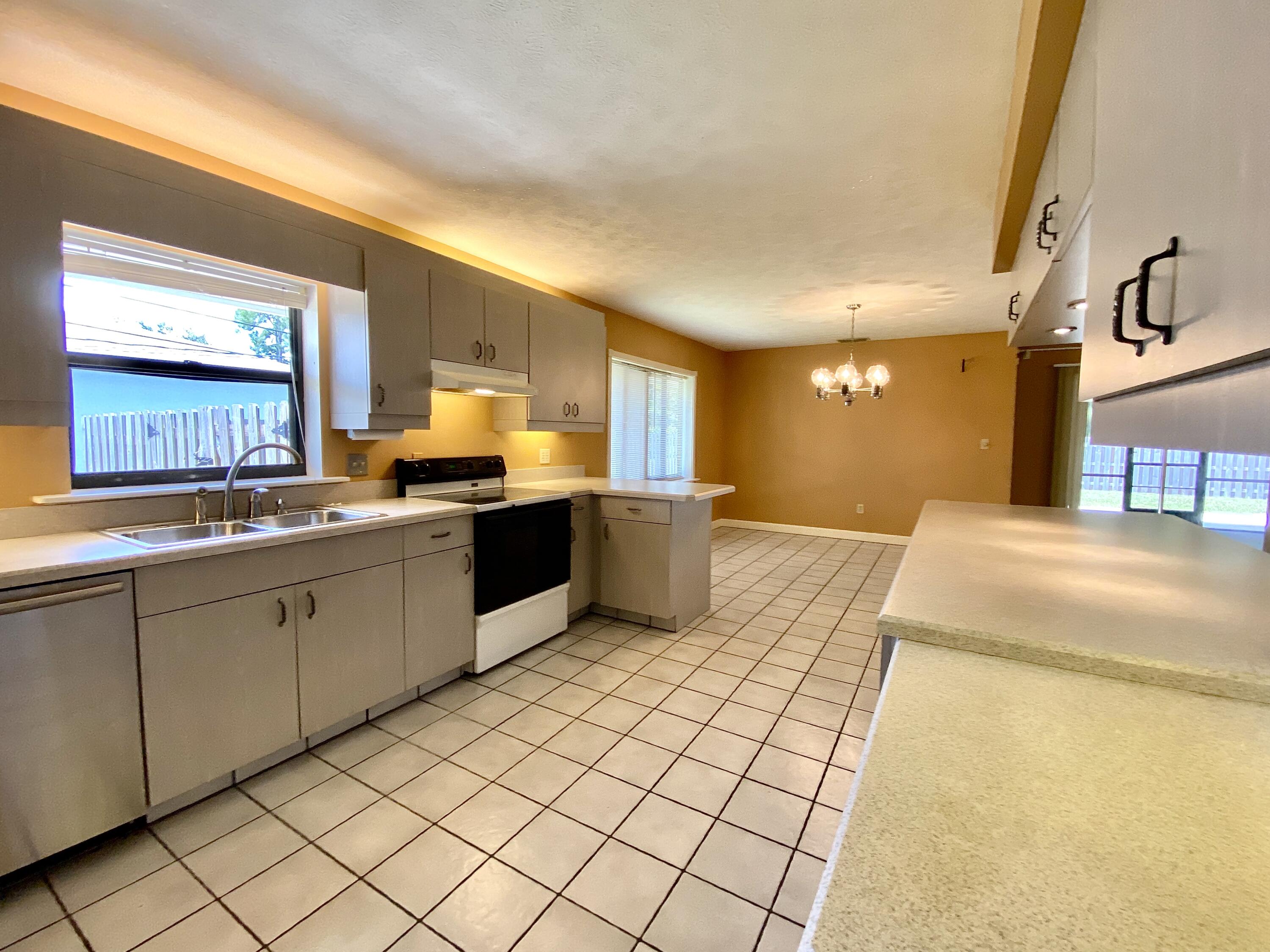 1045 Southwest Bay State Road Port St. Lucie, FL 34953 - Photo 27 of 62 0B3E0188-F4B9-4AA9-9097-972DF7EE7A9E