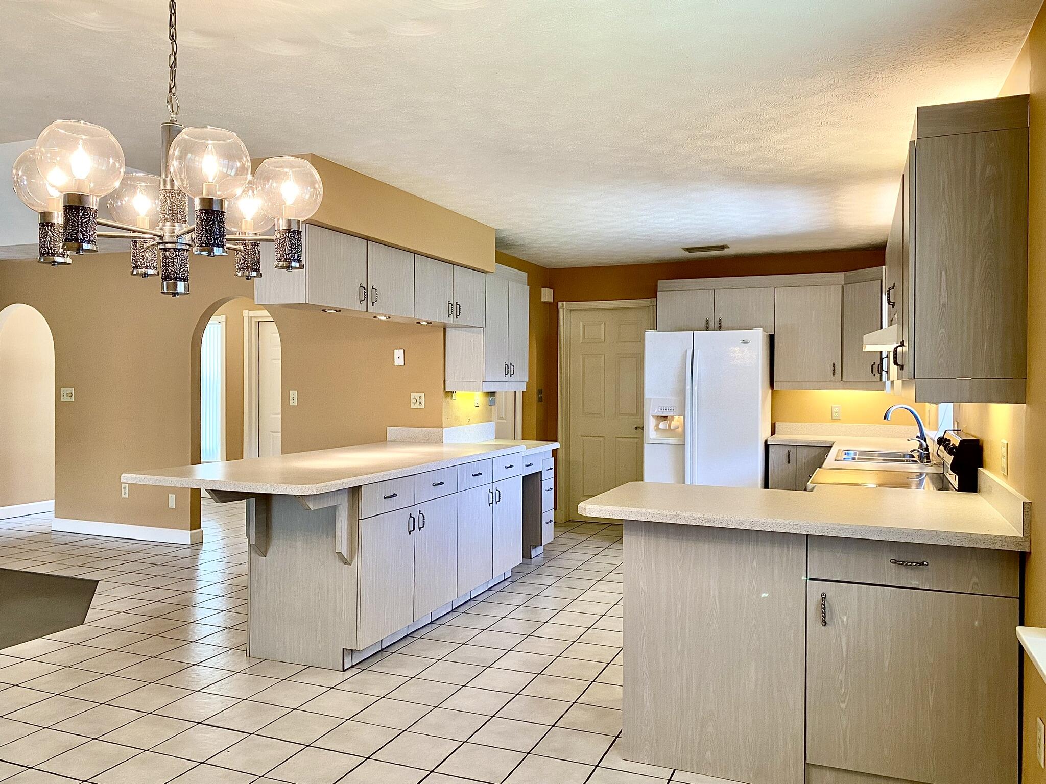 1045 Southwest Bay State Road Port St. Lucie, FL 34953 - Photo 31 of 62 06B9D611-0473-46B0-8A20-F1FA4BD9225E
