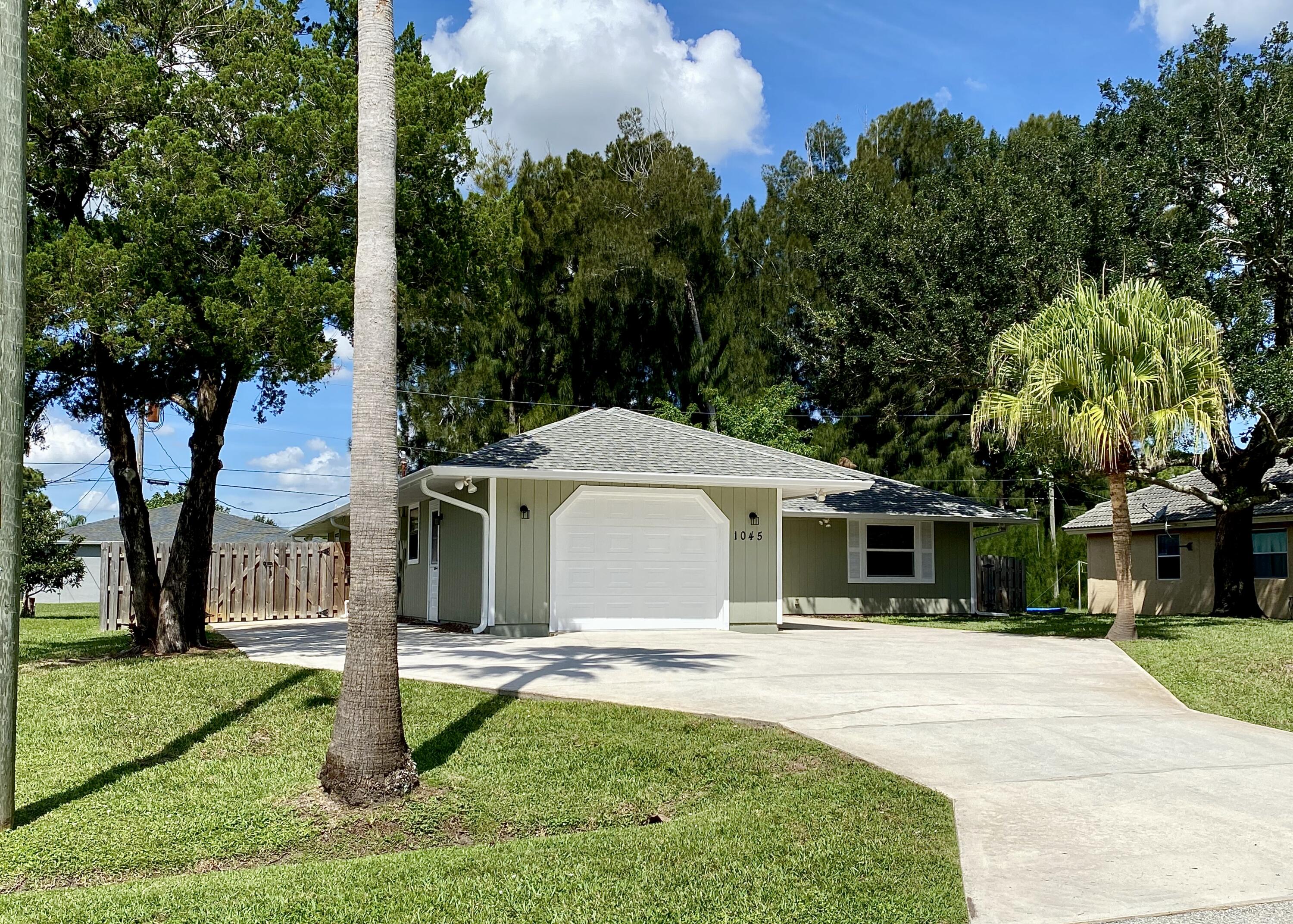 1045 Southwest Bay State Road Port St. Lucie, FL 34953 - Photo 5 of 62 932DCF28-D4B5-496A-B77F-F44D05724270