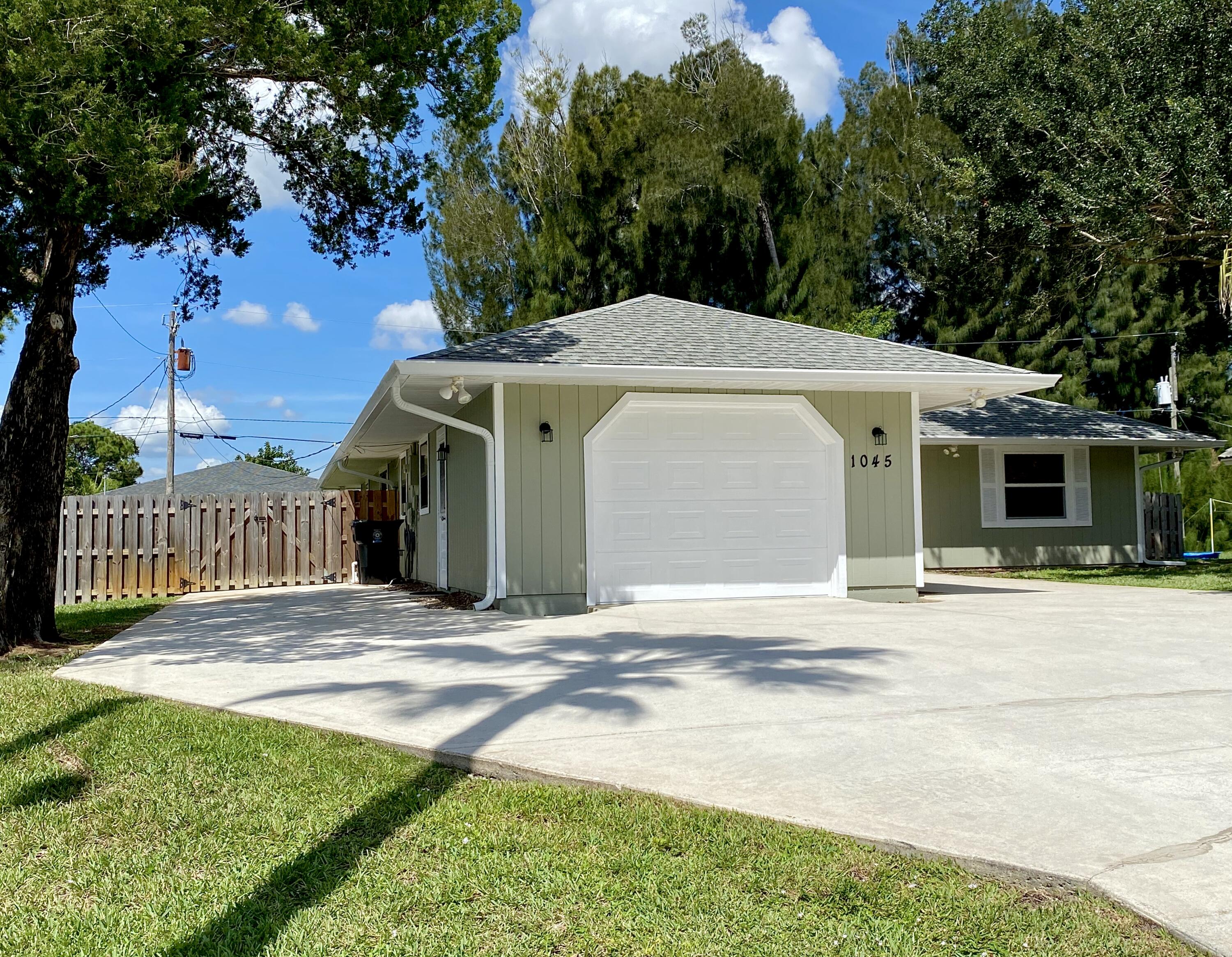 1045 Southwest Bay State Road Port St. Lucie, FL 34953 - Photo 6 of 62 F0B22E20-2B75-4250-90F0-D5CCA73182C1