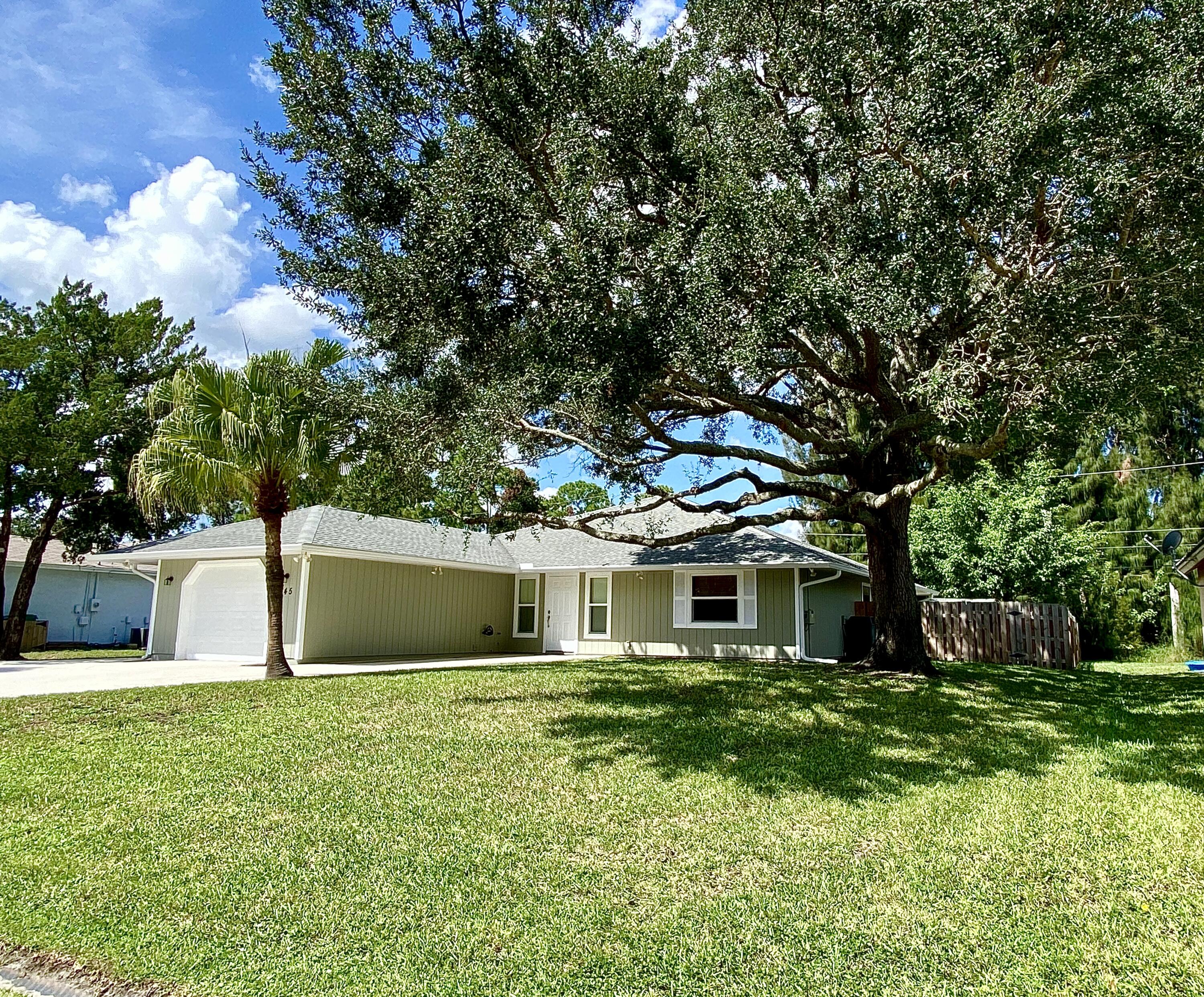 1045 Southwest Bay State Road Port St. Lucie, FL 34953 - Photo 10 of 62 0317199E-FDBB-4F26-96F4-29FC1D3A40F4