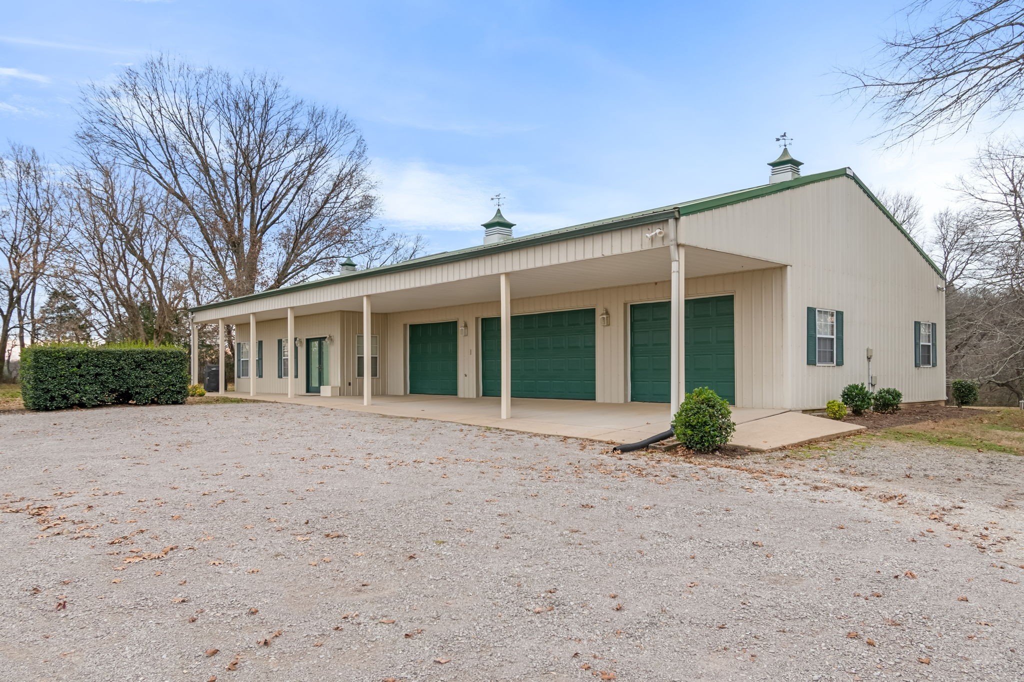 3100 Floyd Road Eagleville, TN 37060 - Photo 14 of 63 a front view of a house with a yard and entryway