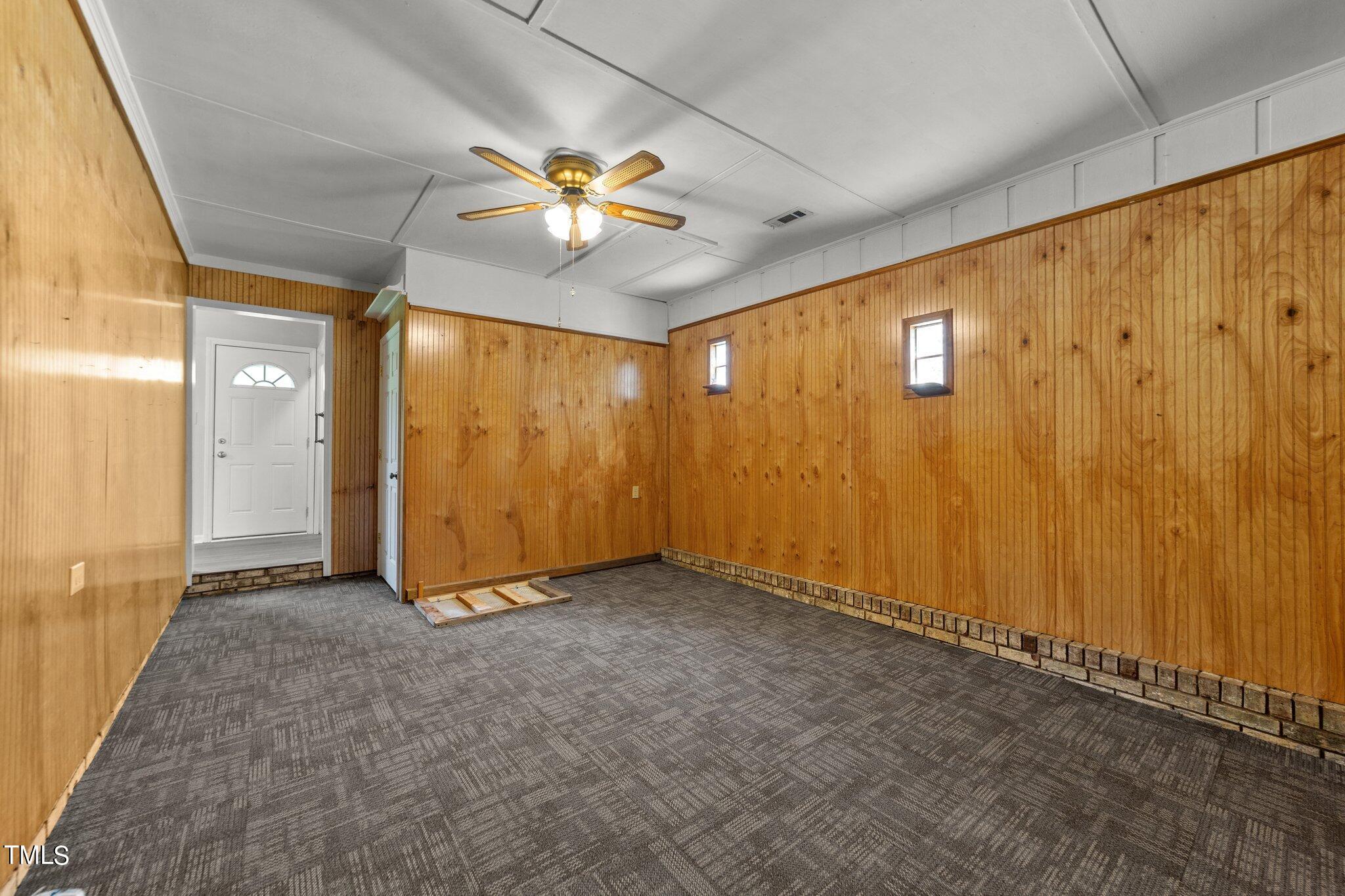 4868 Buffalo Road Selma, NC 27576 - Photo 15 of 48 a view of an empty room with a window