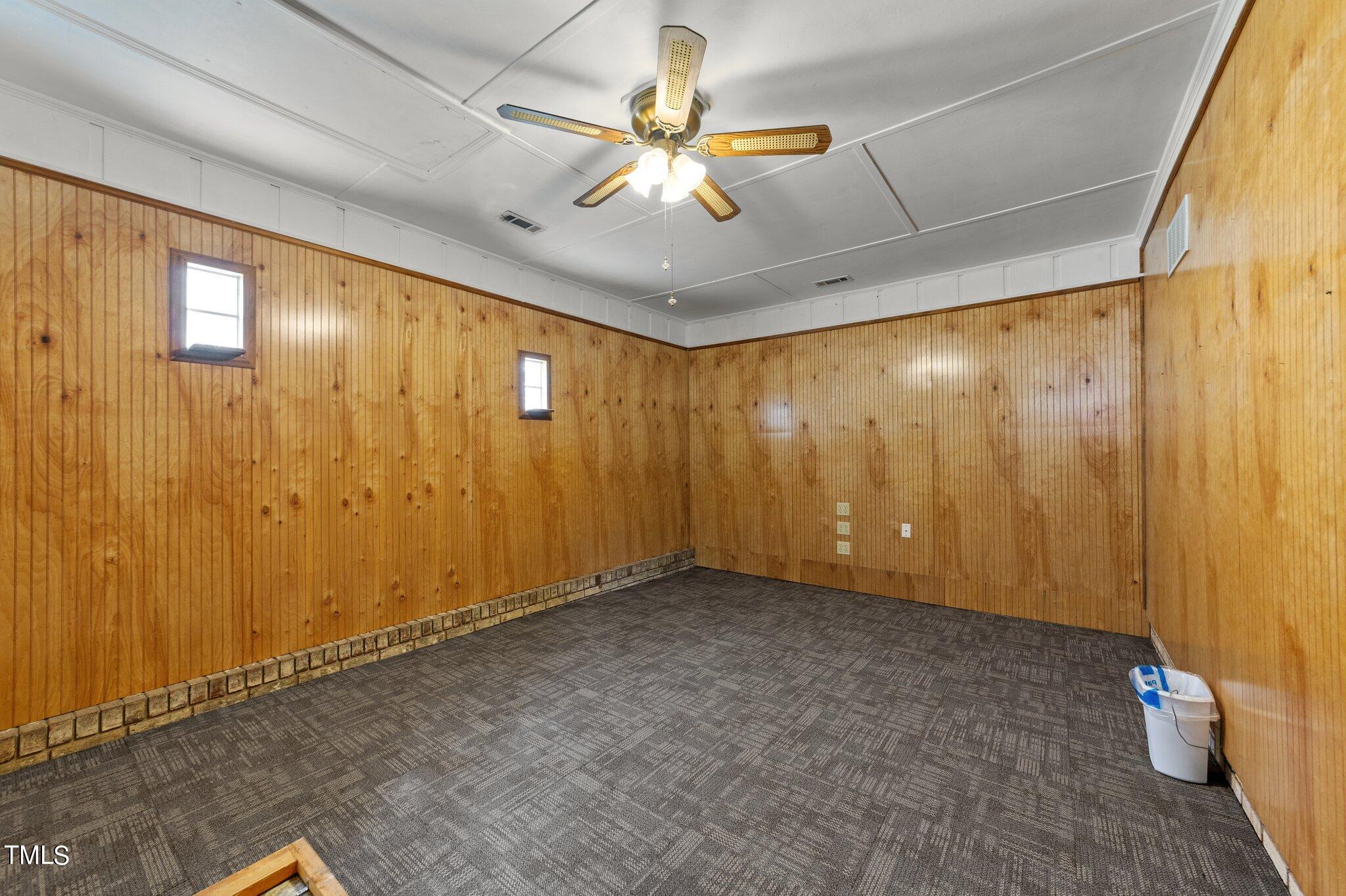 4868 Buffalo Road Selma, NC 27576 - Photo 16 of 48 a view of an empty room with a window