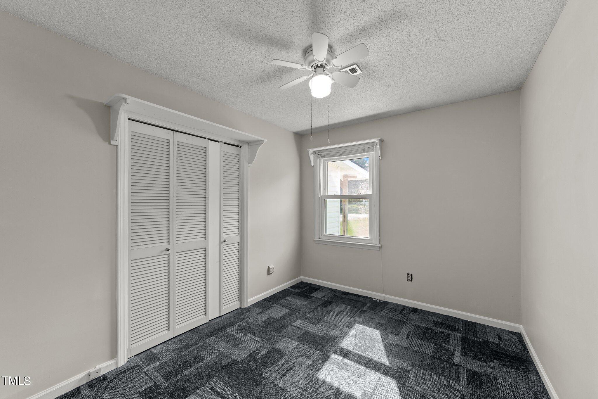 4868 Buffalo Road Selma, NC 27576 - Photo 23 of 48 a view of a livingroom with a window