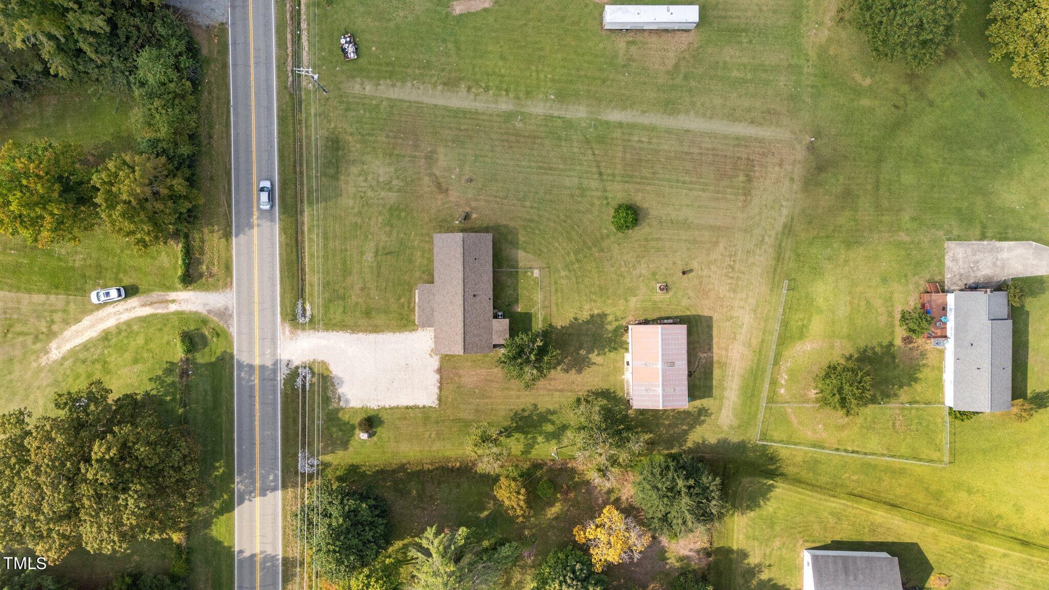 4868 Buffalo Road Selma, NC 27576 - Photo 40 of 48 a bathroom with a shower