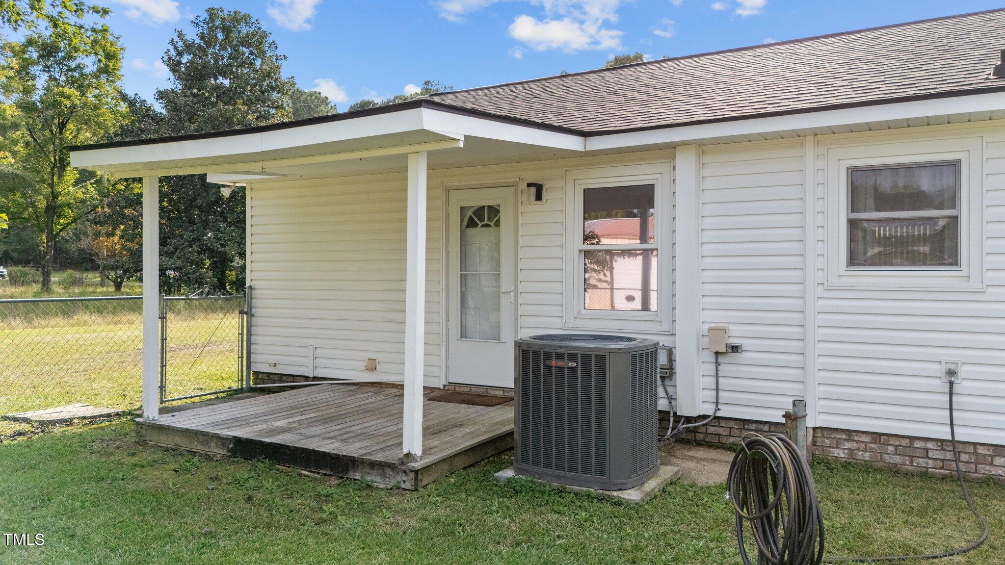 4868 Buffalo Road Selma, NC 27576 - Photo 41 of 48 a front view of a house with a yard