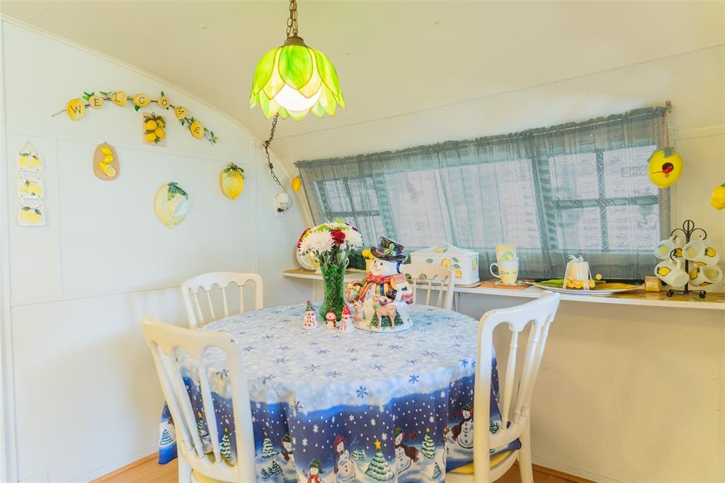 28 Basin Street Lorida, FL 33857 - Photo 5 of 28 a view of a dining room with furniture and a chandelier