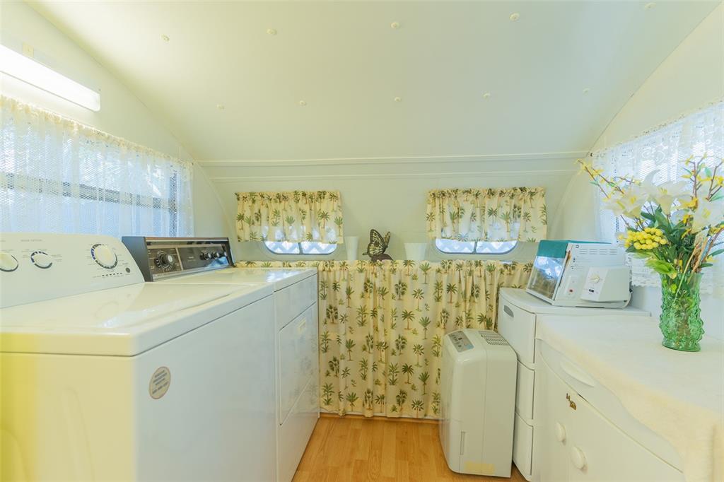 28 Basin Street Lorida, FL 33857 - Photo 9 of 28 a view of utility room with washer and dryer