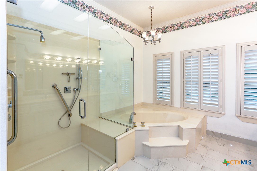 2110 Lakeview Loop Killeen, TX 76543 - Photo 18 of 42 a bathroom with a granite countertop sink a toilet and shower