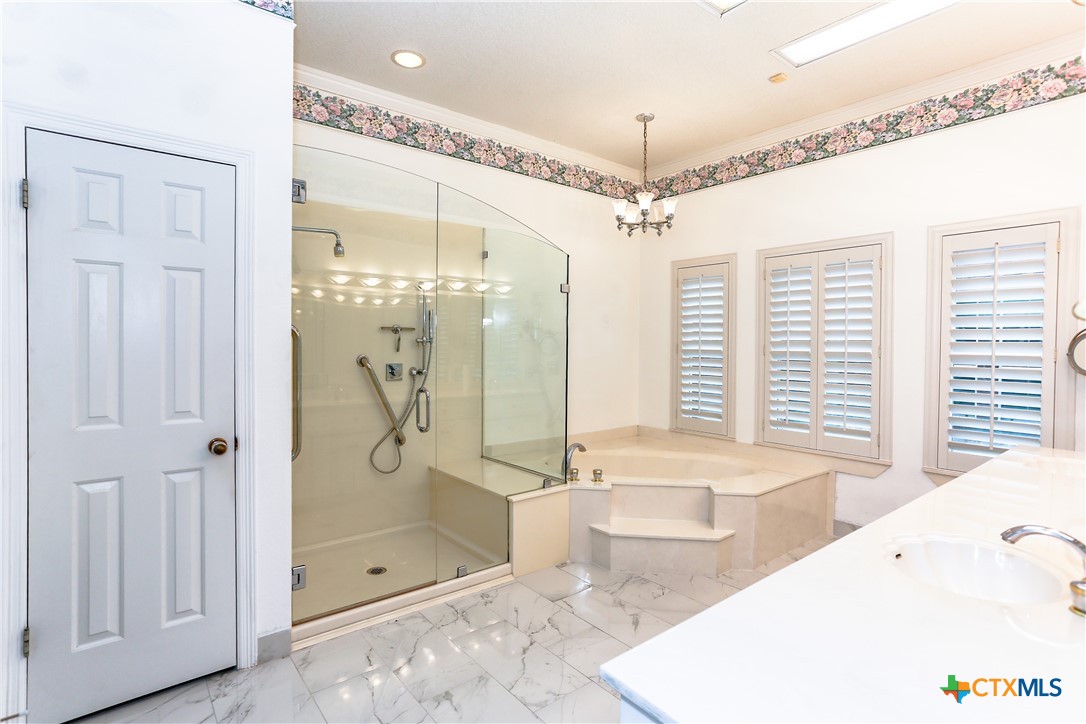 2110 Lakeview Loop Killeen, TX 76543 - Photo 20 of 42 a bathroom with a tub shower and sink