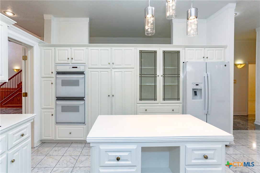 2110 Lakeview Loop Killeen, TX 76543 - Photo 24 of 42 a kitchen that has a stove and a refrigerator