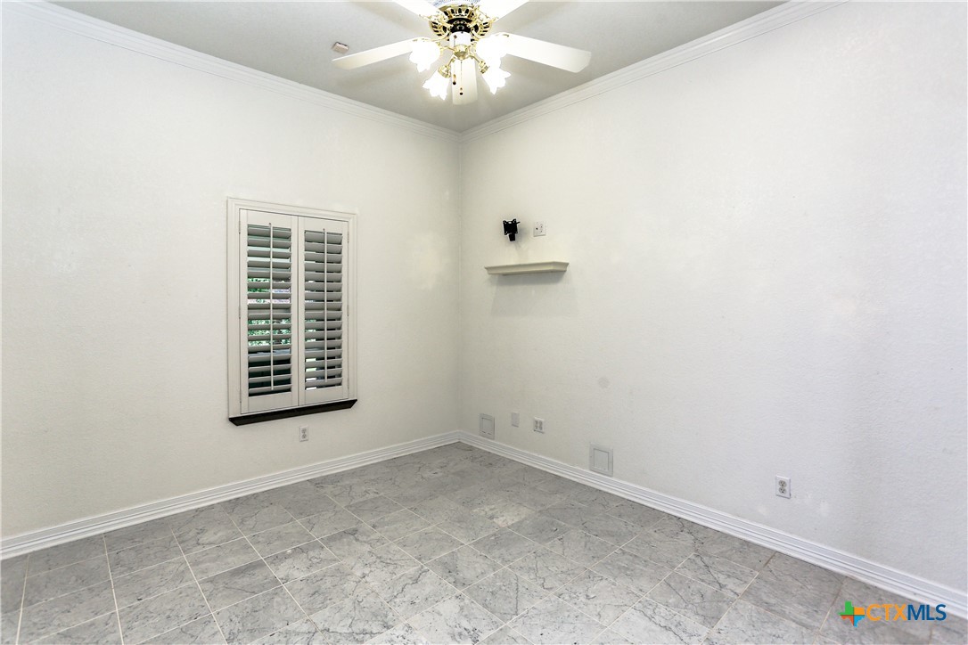2110 Lakeview Loop Killeen, TX 76543 - Photo 29 of 42 an empty room with windows and fan