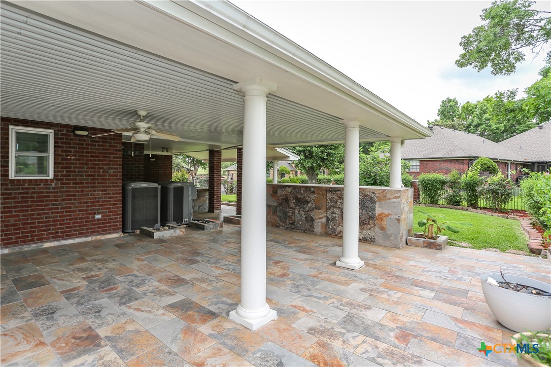 2110 Lakeview Loop Killeen, TX 76543 - Photo 38 of 42 a view of a chair and table in backyard of the house