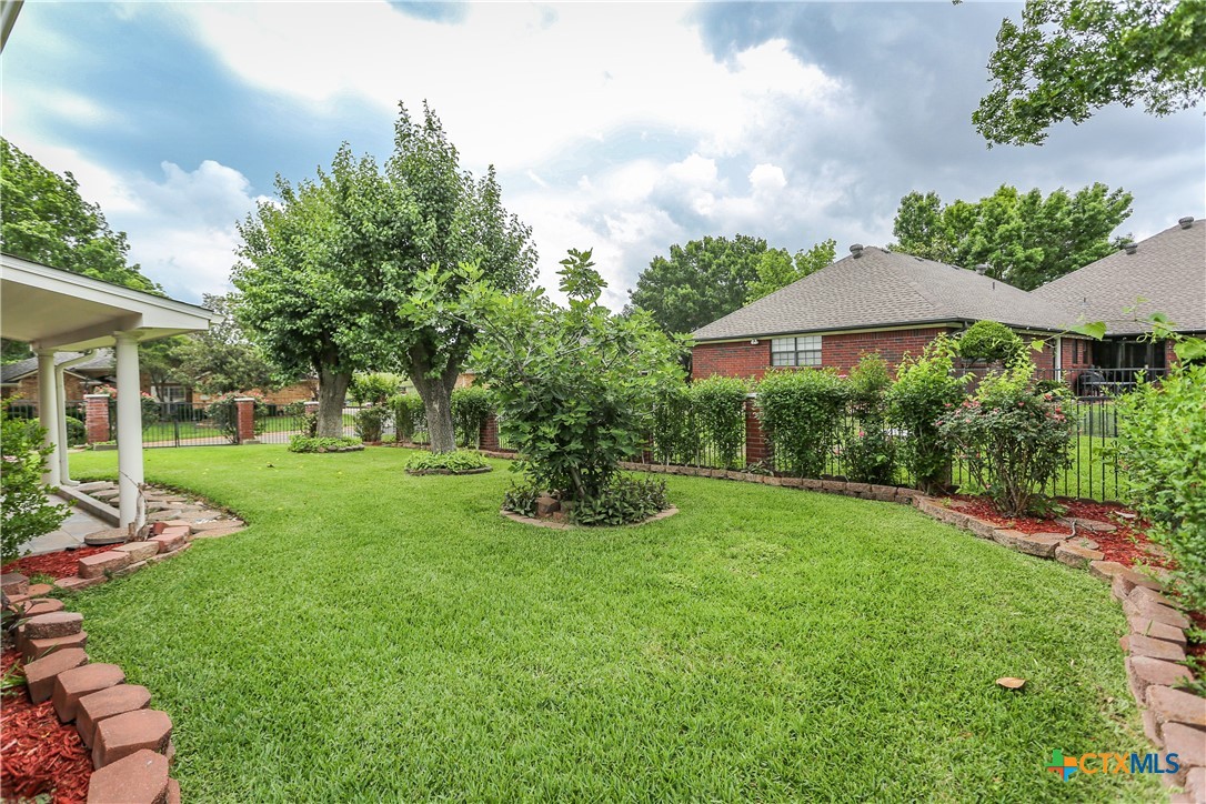 2110 Lakeview Loop Killeen, TX 76543 - Photo 39 of 42 a view of a garden with a slide