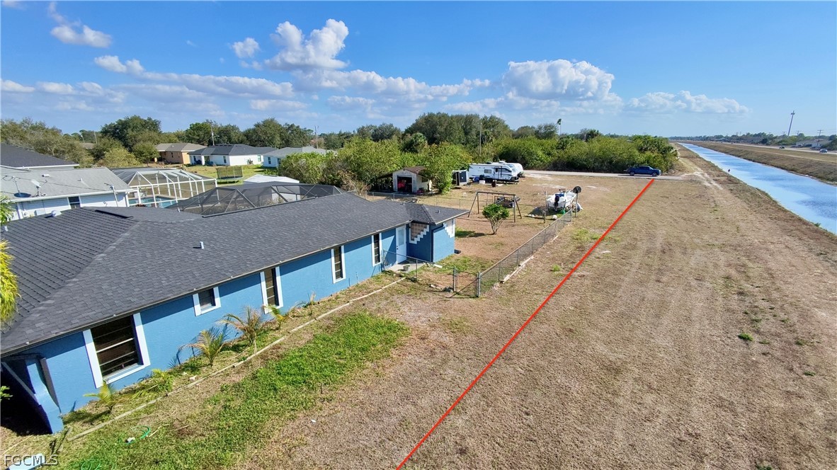 3015 8th Street Southwest Lehigh Acres, FL 33976 - Photo 4 of 34 a view of a terrace with a outdoor space