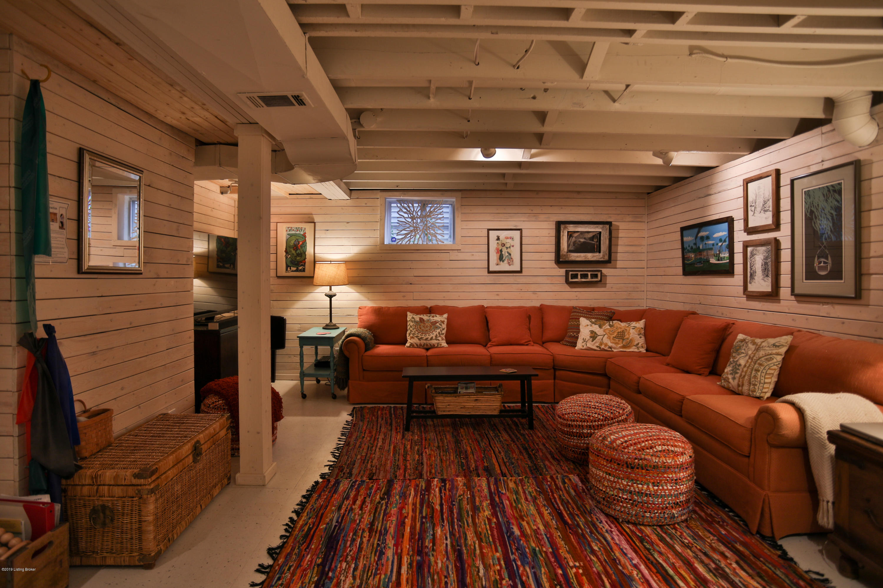 359 Ridgeway Avenue Louisville, KY 40207 - Photo 27 of 48 Recently finished TV/Exercise area. The Sectional Sofa Stays!