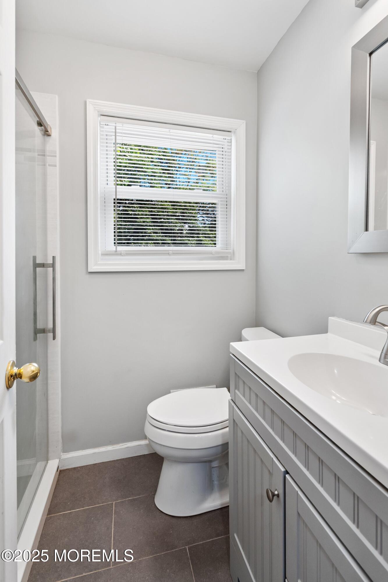 13 Rhode Island Drive Jackson, NJ 08527 - Photo 15 of 30 a bathroom with a toilet a sink and a window