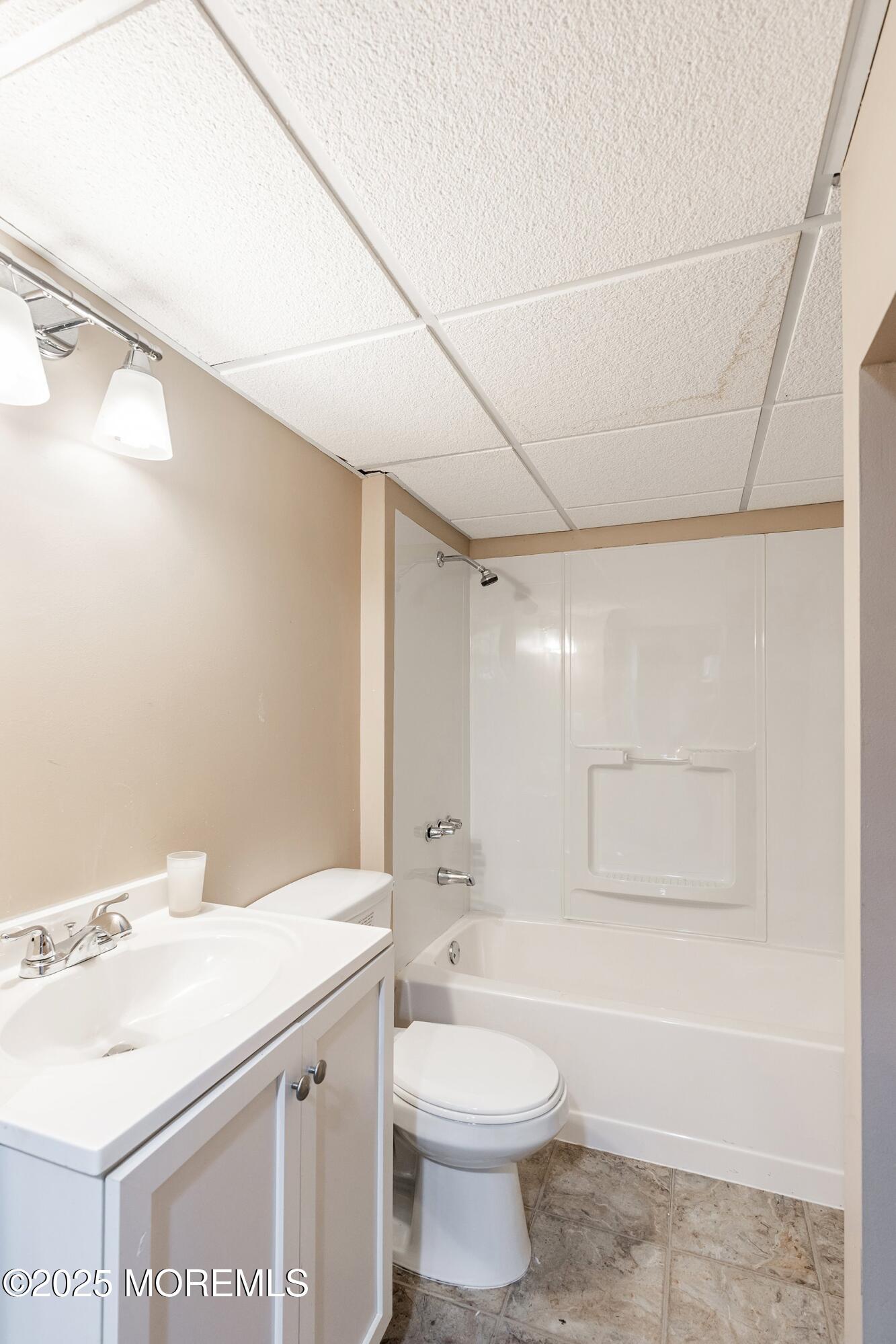 13 Rhode Island Drive Jackson, NJ 08527 - Photo 22 of 30 a bathroom with a sink a toilet and shower