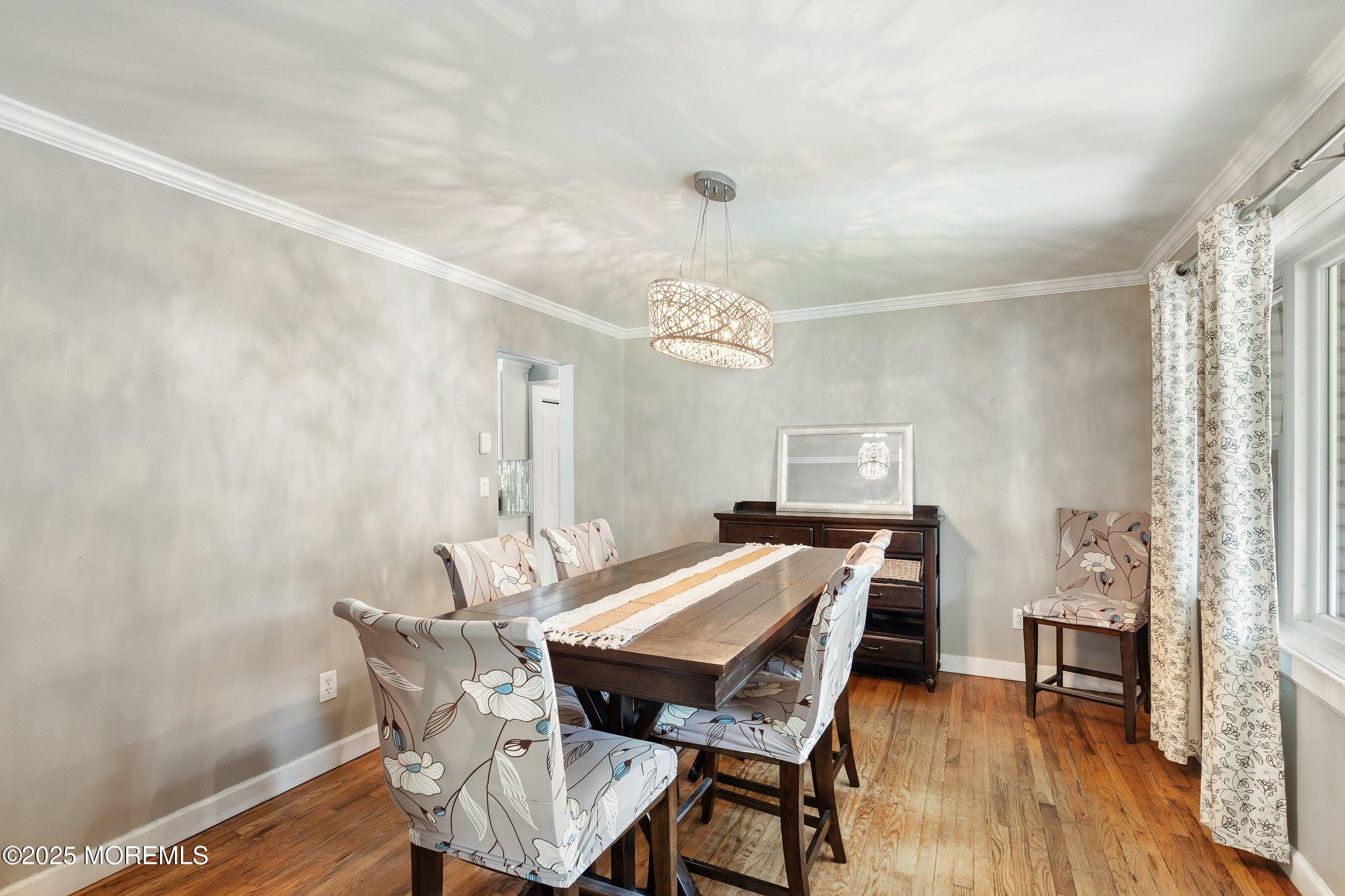 13 Rhode Island Drive Jackson, NJ 08527 - Photo 6 of 30 a view of a dining room with furniture and wooden floor