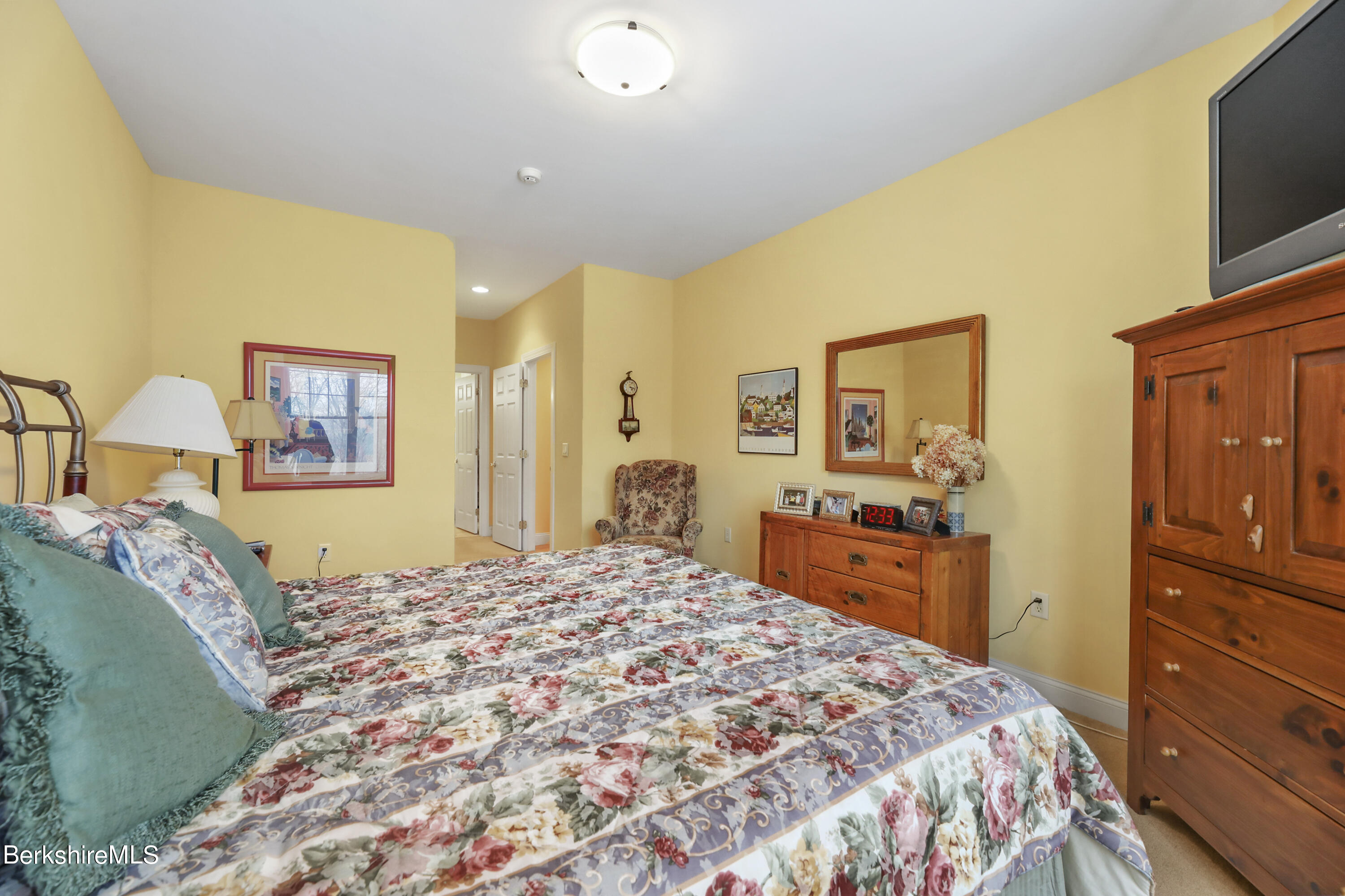 67 Alpine Trail Pittsfield, MA 01201 - Photo 13 of 40 a bedroom with a bed and a dresser in it