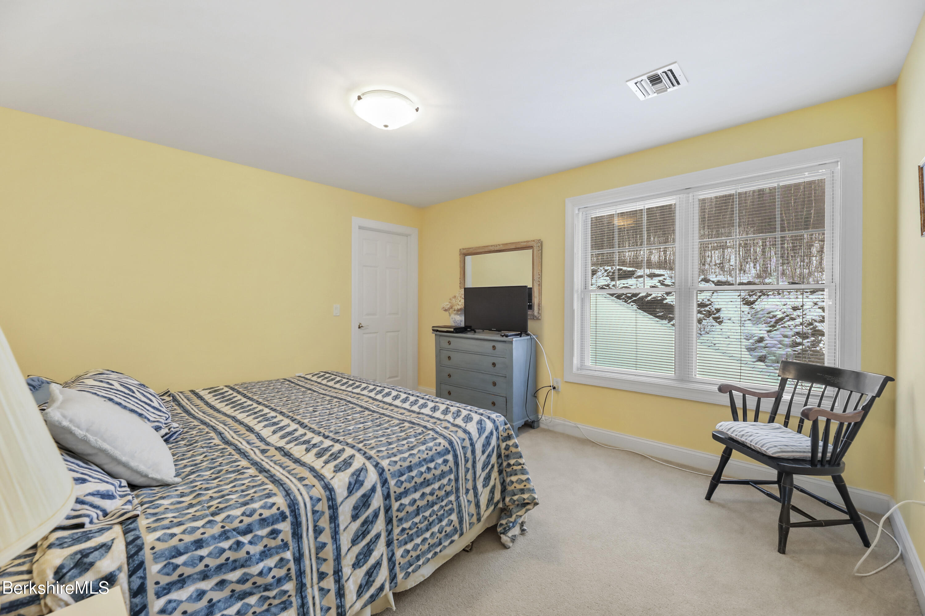67 Alpine Trail Pittsfield, MA 01201 - Photo 21 of 40 a bedroom with a bed and a couch