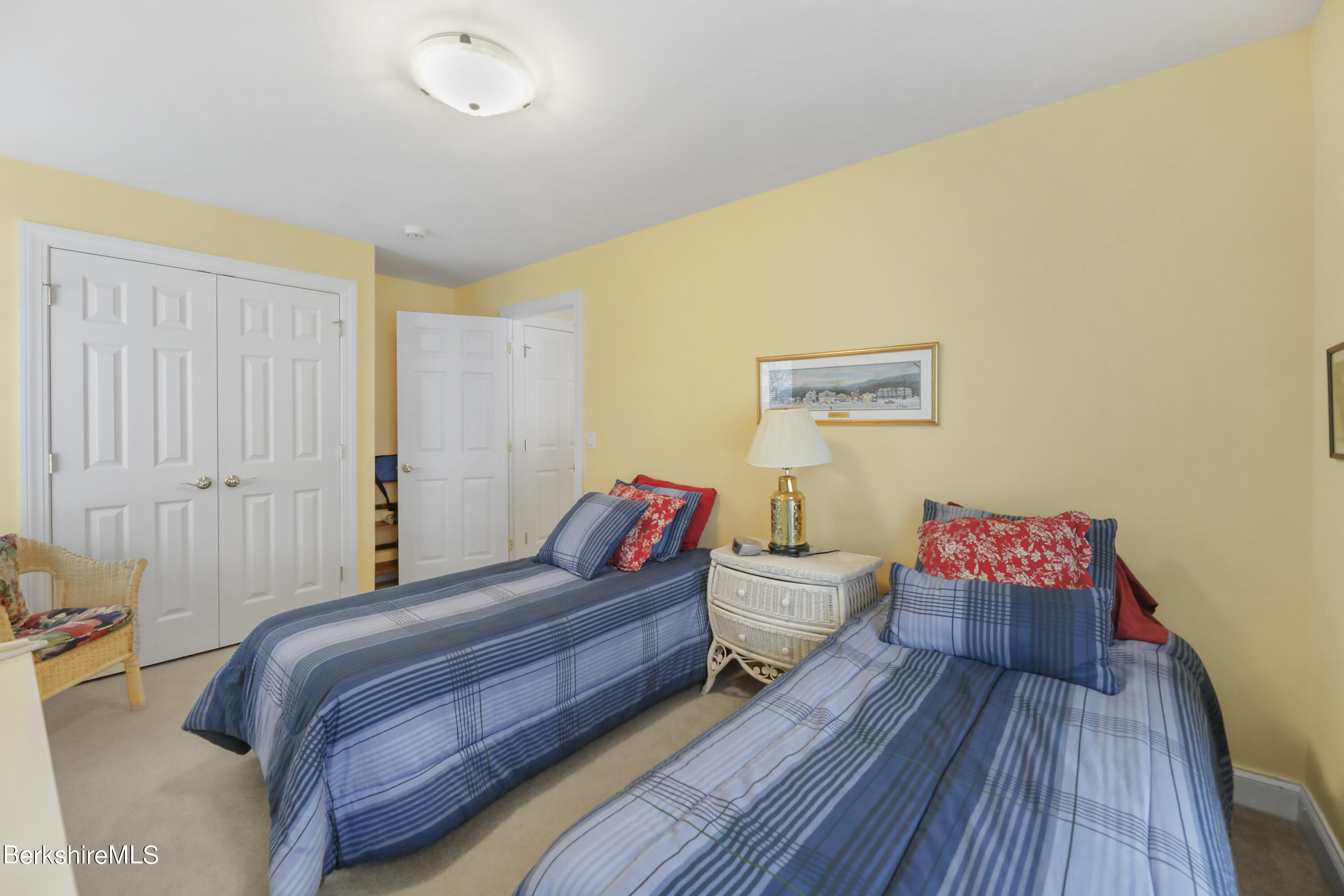 67 Alpine Trail Pittsfield, MA 01201 - Photo 23 of 40 a bedroom with a bed and wooden floor