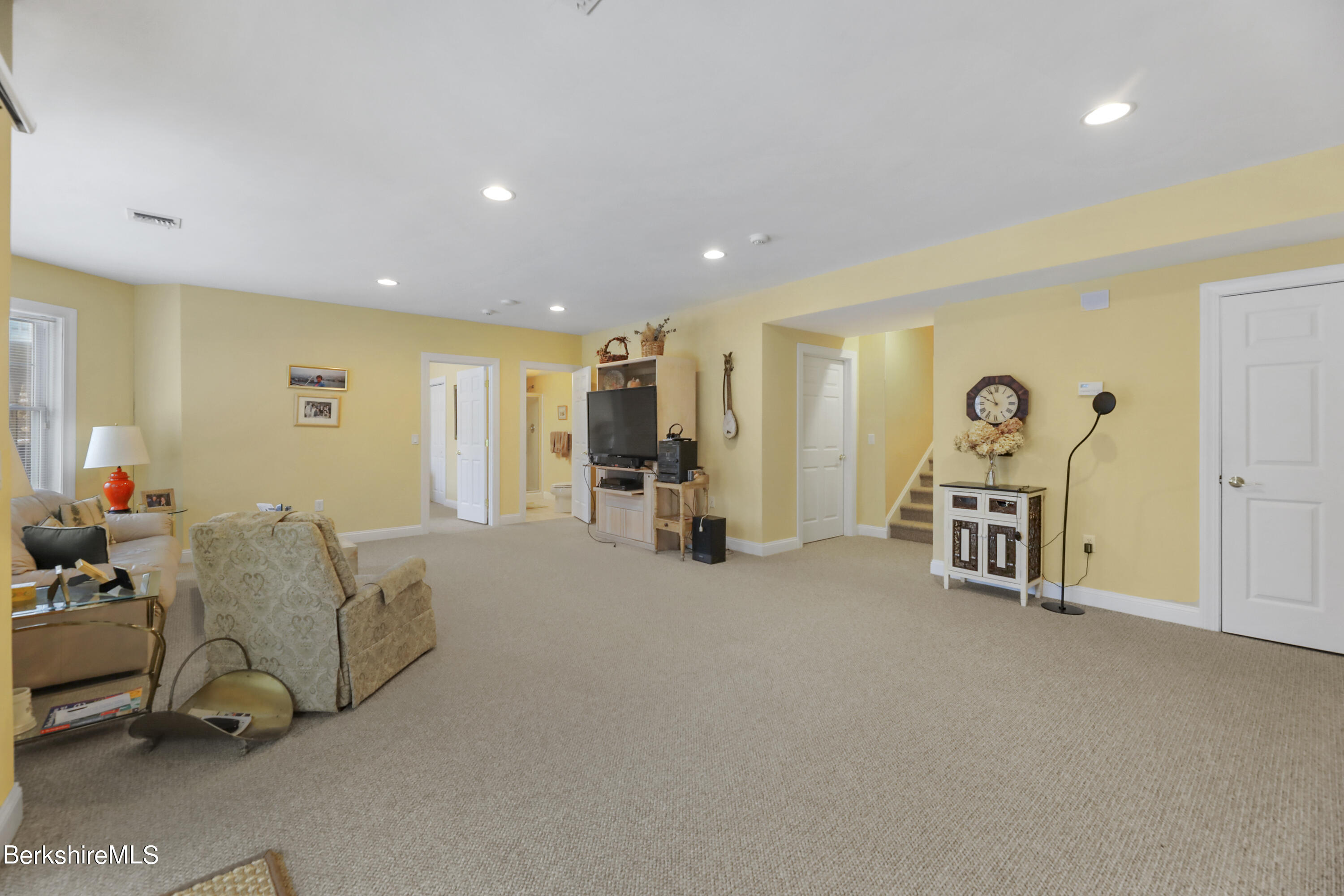67 Alpine Trail Pittsfield, MA 01201 - Photo 26 of 40 a living room with furniture and a gym machine