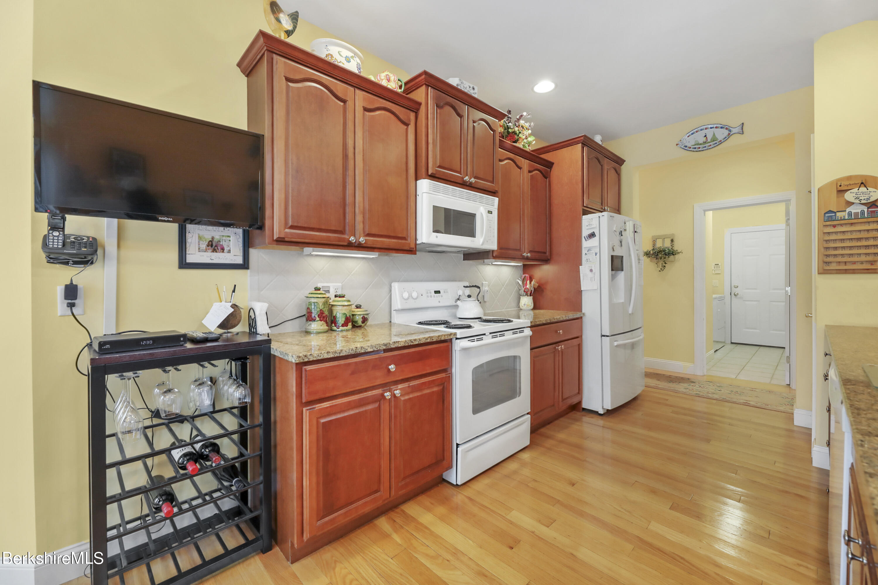 67 Alpine Trail Pittsfield, MA 01201 - Photo 9 of 40 a kitchen with stainless steel appliances a stove a sink and a refrigerator