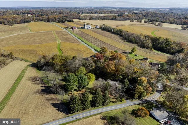 a close view of a house with a yard and garage