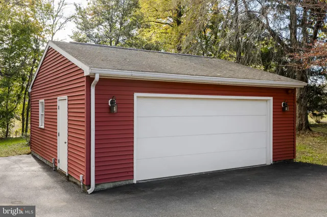a view of an empty room with a fireplace