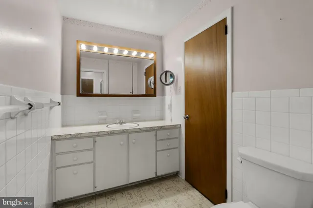 a large room with a large window and outdoor space