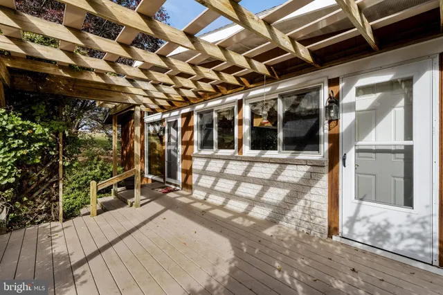 a view of a chairs on the deck