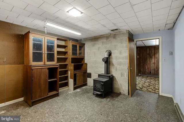 a picture of a bathroom with a shower