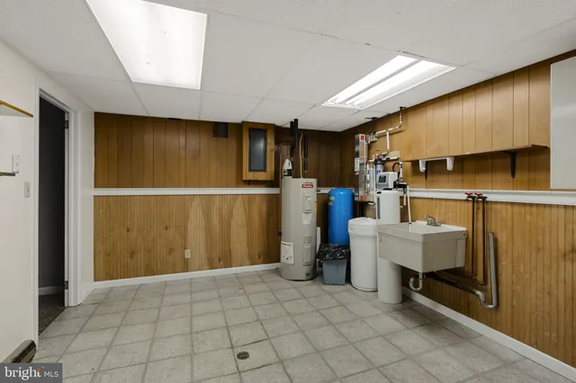 a picture of a bathroom with a shower