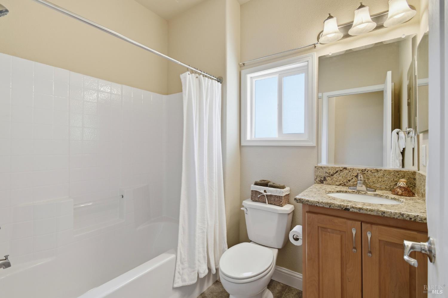 120 Shamrock Circle Santa Rosa, CA 95403 - Photo 32 of 45 a bathroom with a granite countertop sink toilet and shower