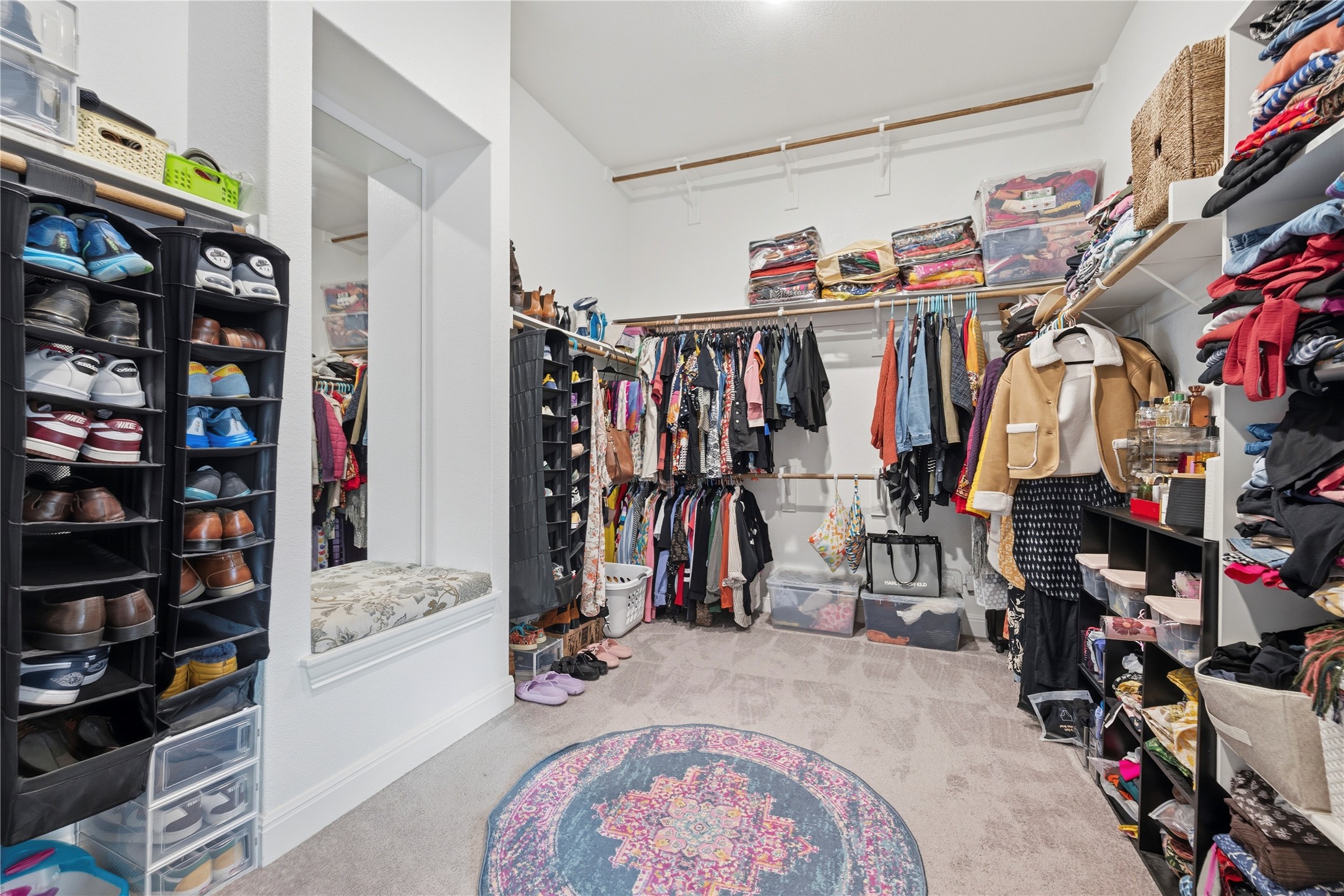 138 Rpd Spgs Cove Georgetown, TX 78628 - Photo 33 of 37 a view of walk in closet with clothes and shoes