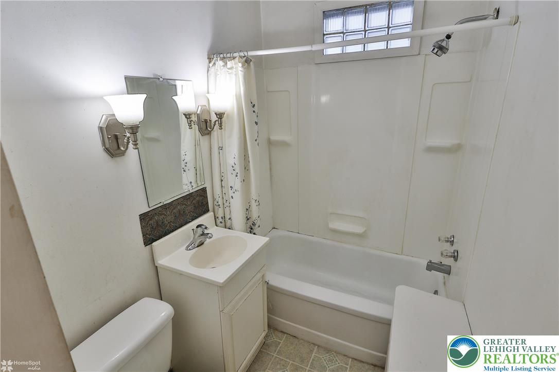 526 2nd Avenue Bethlehem, PA 18018 - Photo 13 of 40 a bathroom with a tub a sink and a shower