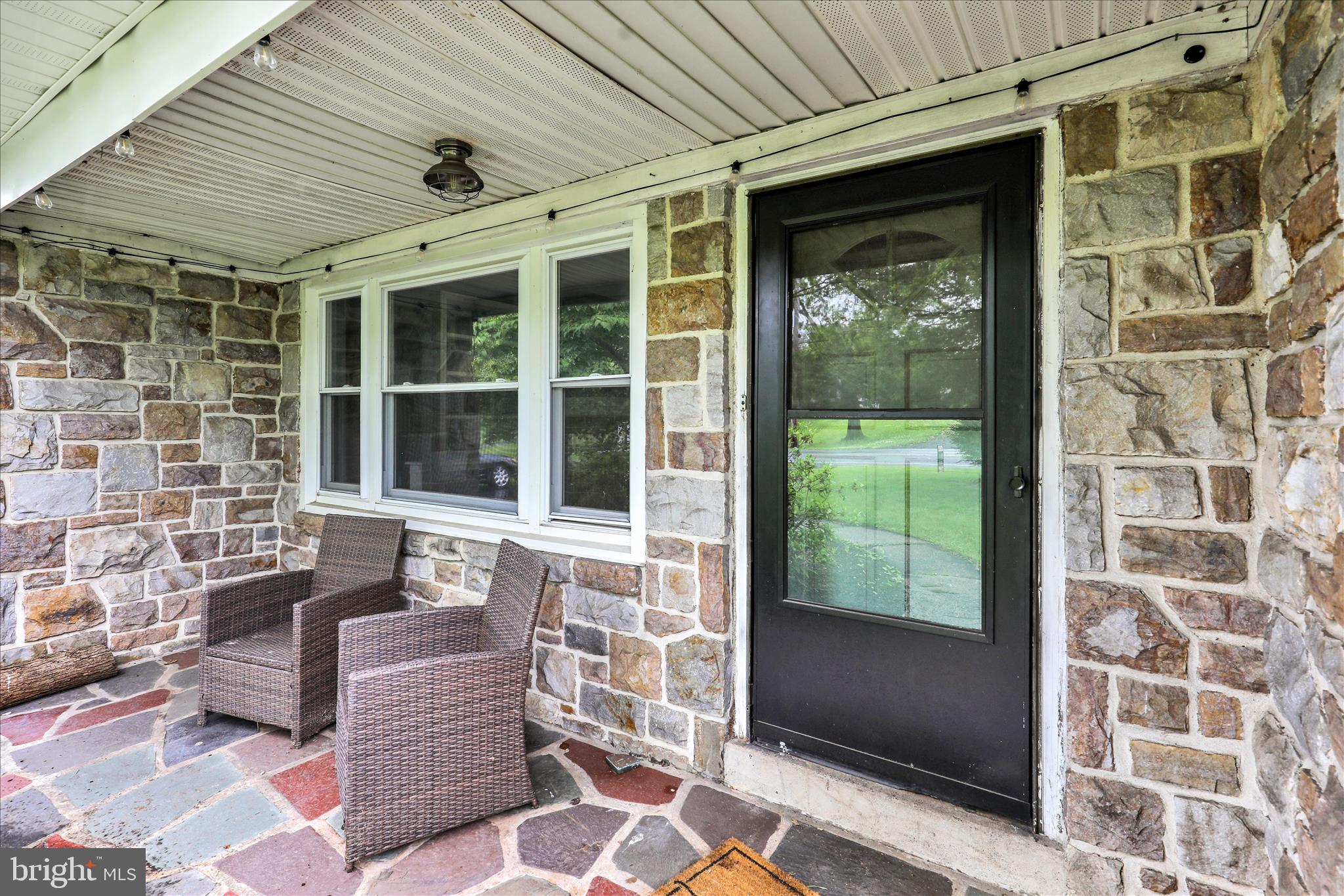 434 East Moyer Road Pottstown, PA 19464 - Photo 5 of 38 a front view of a house with a large window