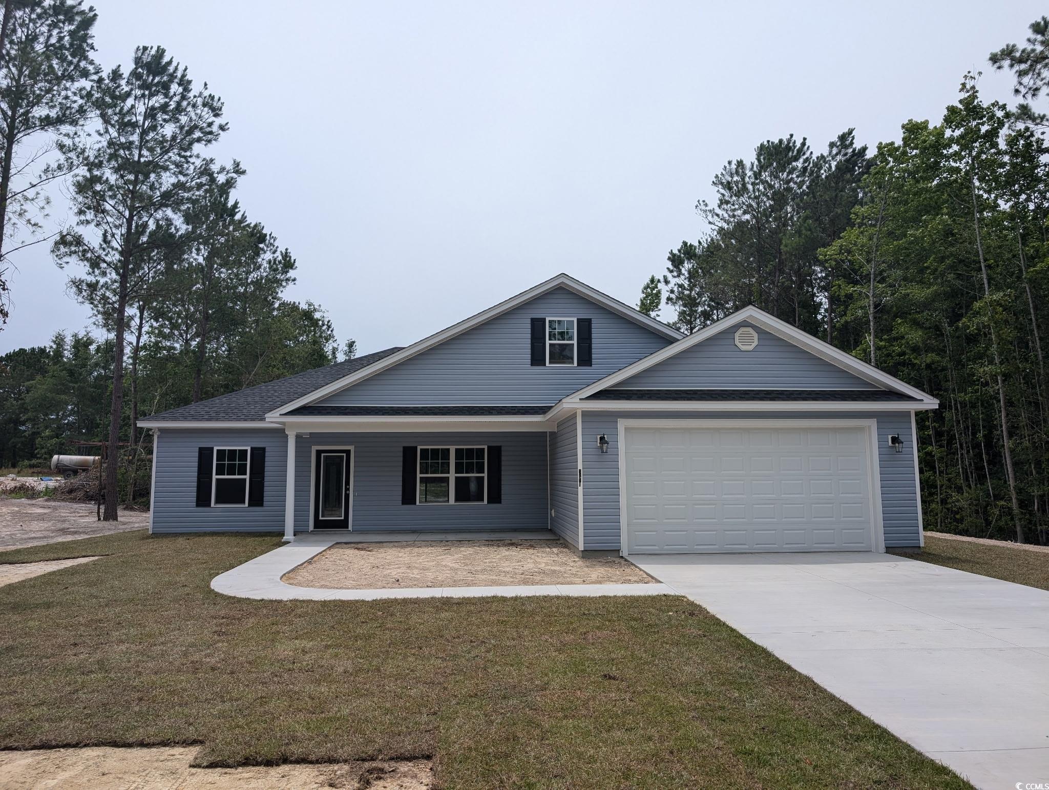 4481 Privetts Road Conway, SC 29526 - Photo 1 of 1 Ranch-style home with a garage and a front lawn