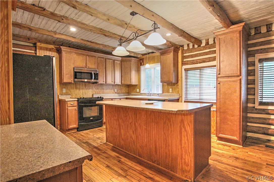258 East Richmond Road Richmond, VA 23223 - Photo 13 of 40 a kitchen with stainless steel appliances granite countertop a sink a stove and a refrigerator