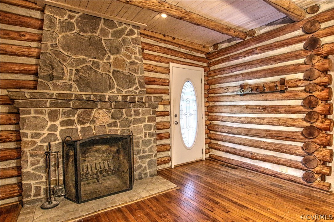 258 East Richmond Road Richmond, VA 23223 - Photo 4 of 40 a view of wooden floor with a fireplace