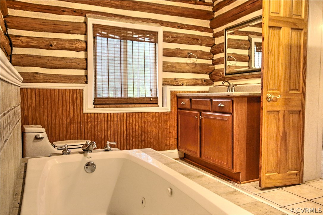 258 East Richmond Road Richmond, VA 23223 - Photo 6 of 40 a bathroom with a tub and shower