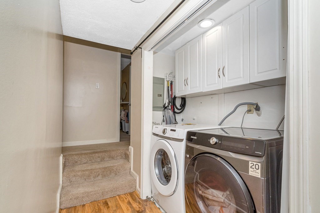 42 Epping Street, Unit 2 Lowell, MA 01852 - Photo 21 of 33 a utility room with dryer and washer