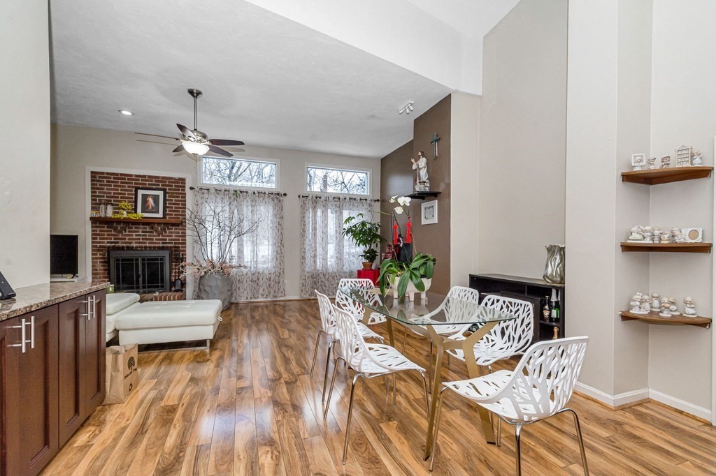 42 Epping Street, Unit 2 Lowell, MA 01852 - Photo 6 of 33 a living room with furniture and a wooden floor