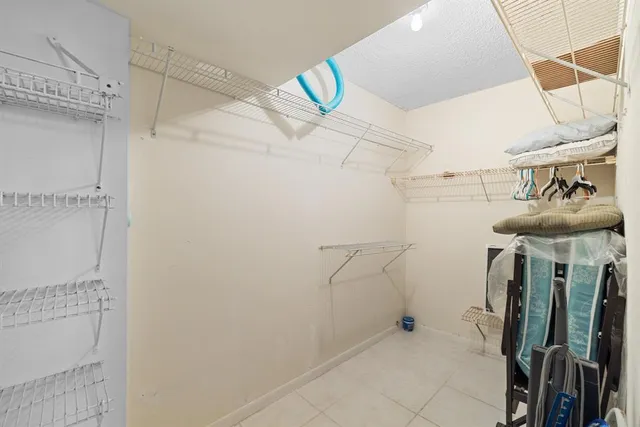 a view of a room with racks on the wall