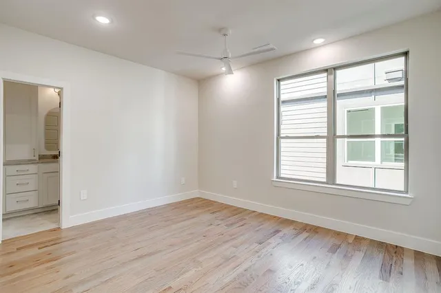 a bathroom with a sink and vanity